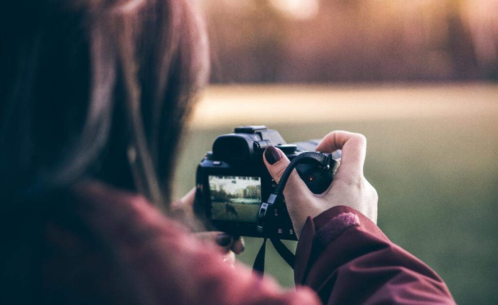 Photographer taking photo of the landscape view.