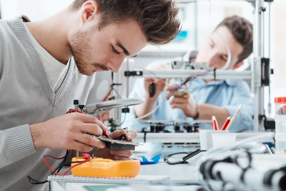 Engineering students working in the lab.