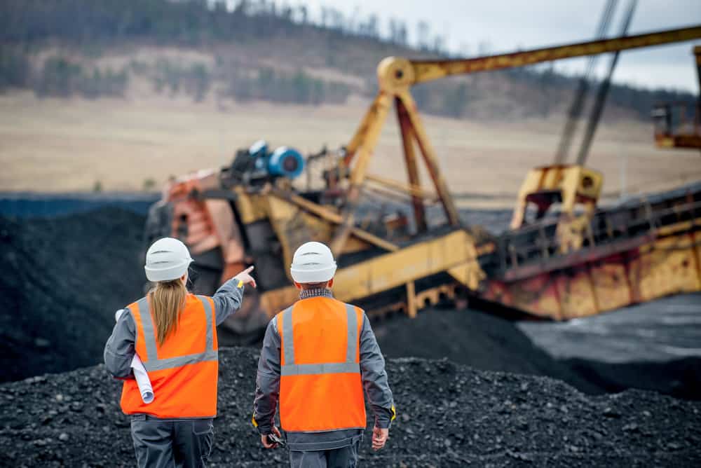 Mining engineers working in an open pit.