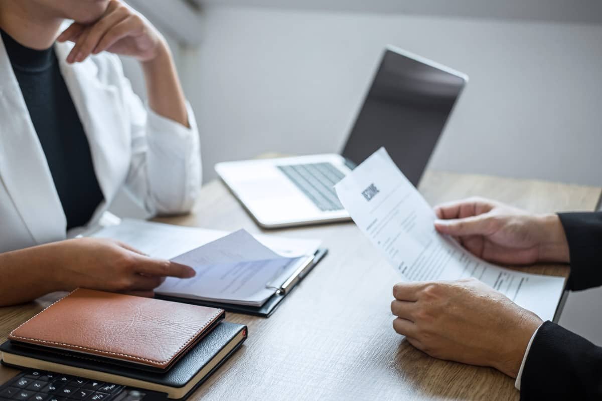 Employer interviewing an applicant.