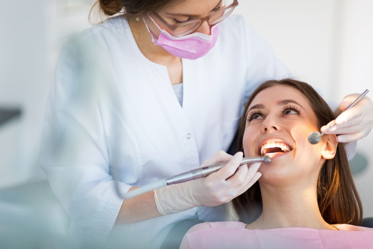 Dentist and patient in a dentist office.